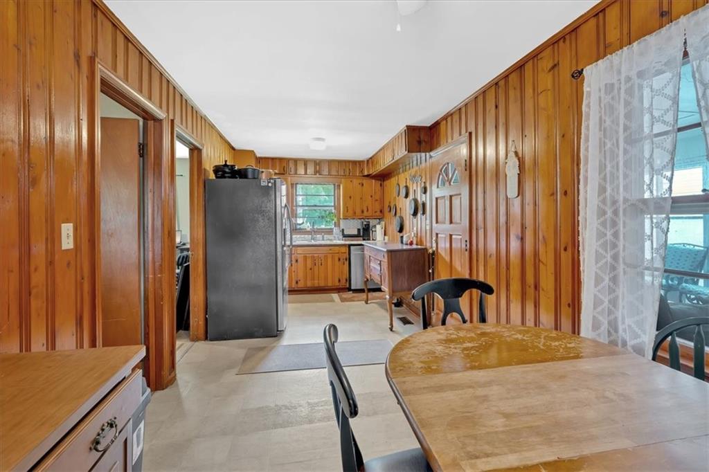 7783 Cantrell Road Douglasville, GA 30135 - Photo 16 of 38 a bedroom with furniture and a large window