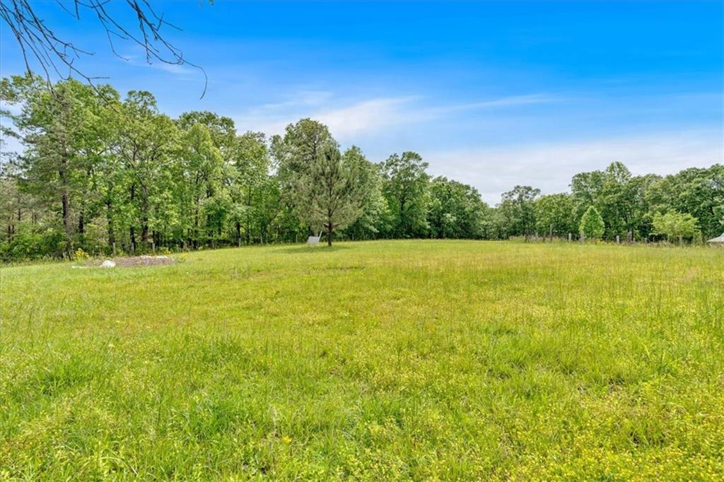 7783 Cantrell Road Douglasville, GA 30135 - Photo 33 of 38 a view of a field with an outdoor space