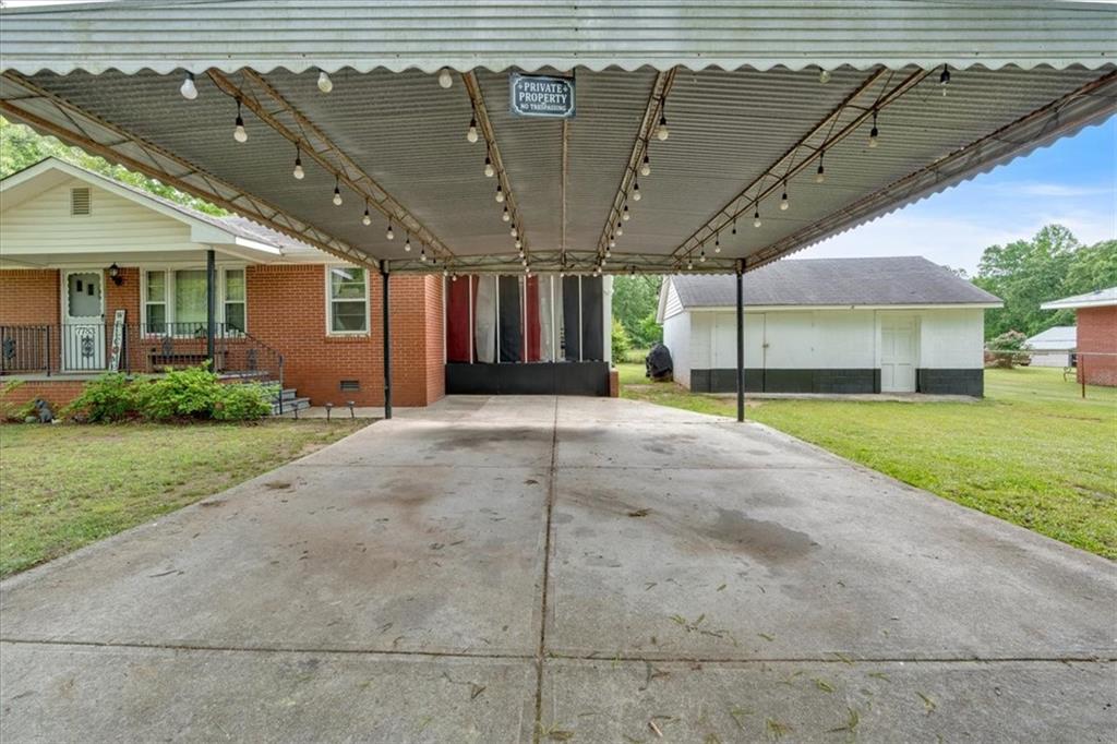 7783 Cantrell Road Douglasville, GA 30135 - Photo 6 of 38 a view of a porch