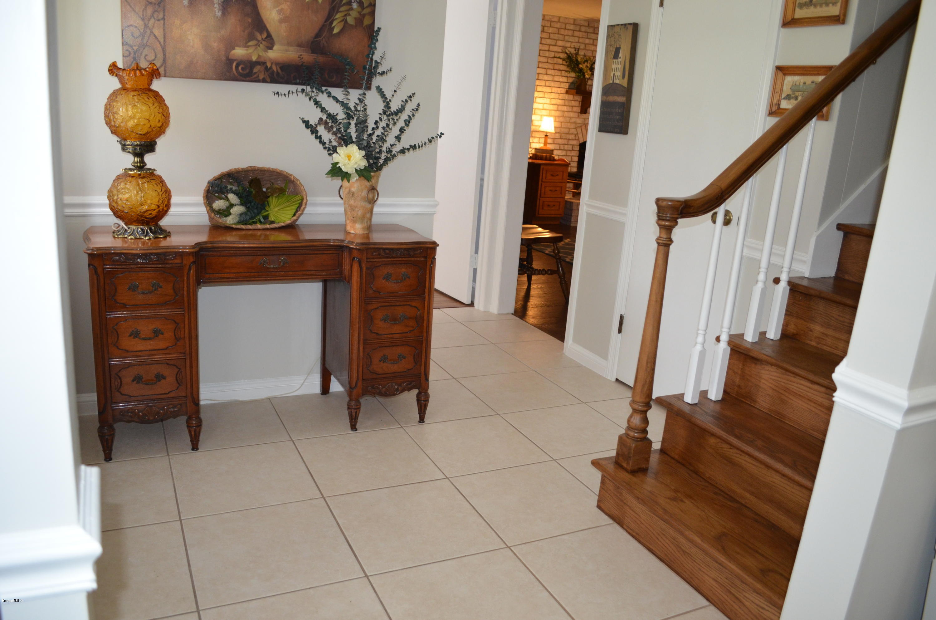 1061 Knecht Road Northeast Palm Bay, FL 32905 - Photo 14 of 43 a view of kitchen with furniture and staircase