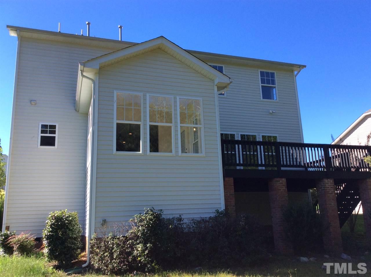136 Locke Woods Road Raleigh, NC 27603 - Photo 2 of 18 a front view of a house with balcony