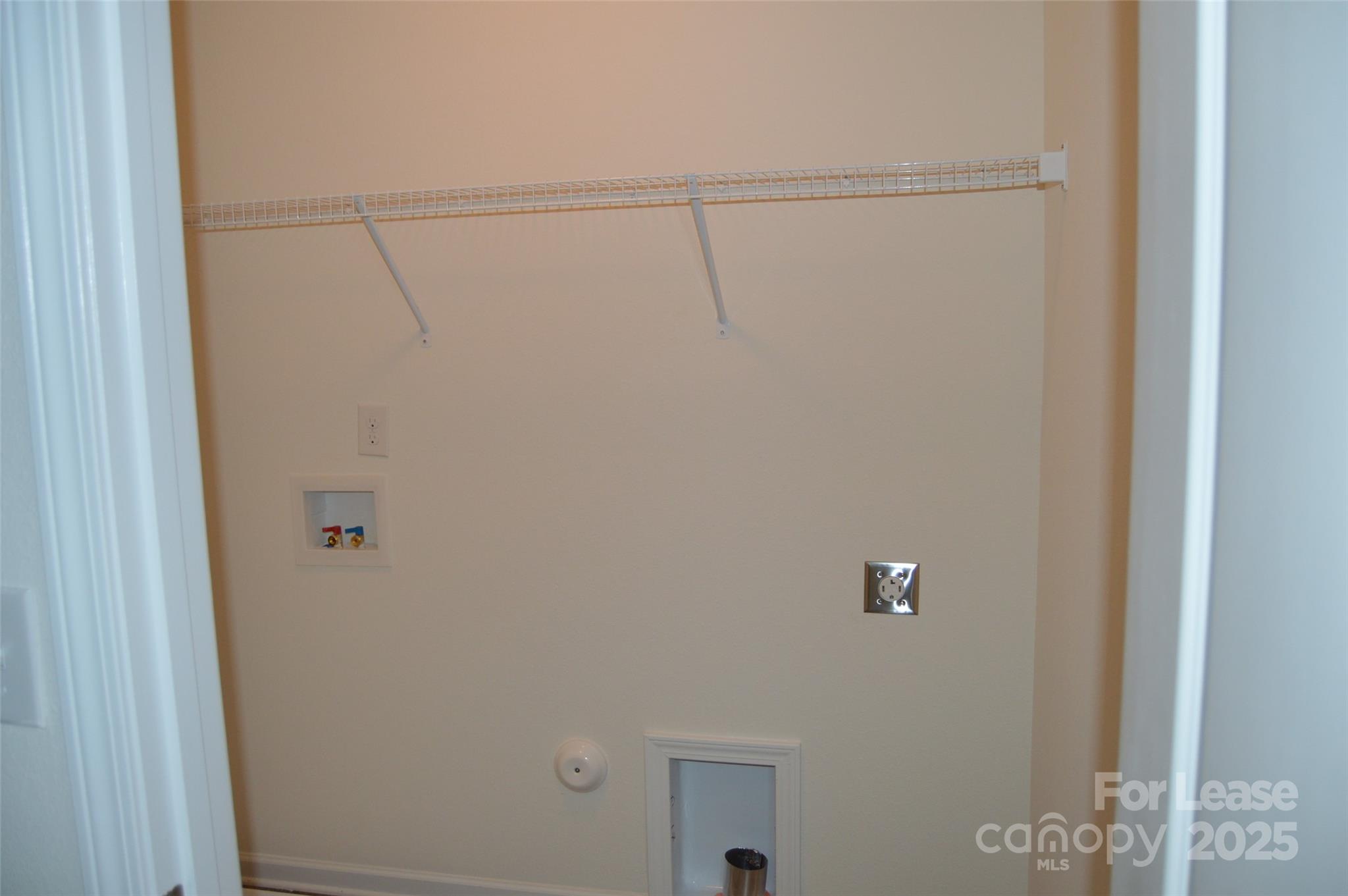 117 Quail Springs Road Statesville, NC 28677 - Photo 18 of 22 a view of a room with racks on the wall