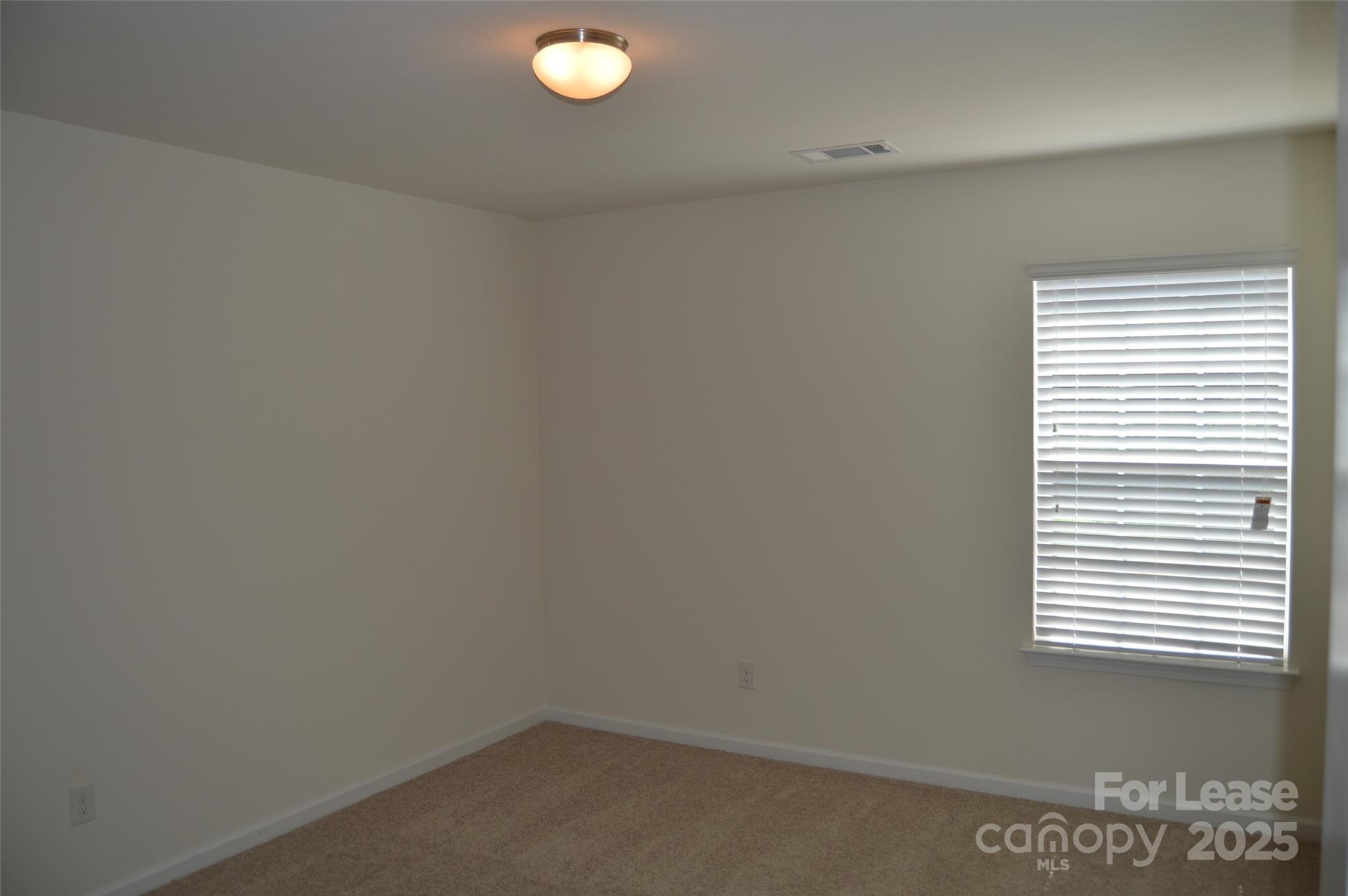 117 Quail Springs Road Statesville, NC 28677 - Photo 19 of 22 an empty room that has a window