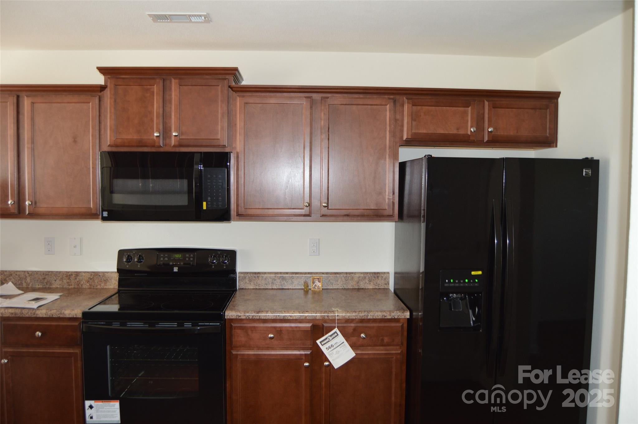117 Quail Springs Road Statesville, NC 28677 - Photo 6 of 22 a kitchen with a sink and a stove top oven