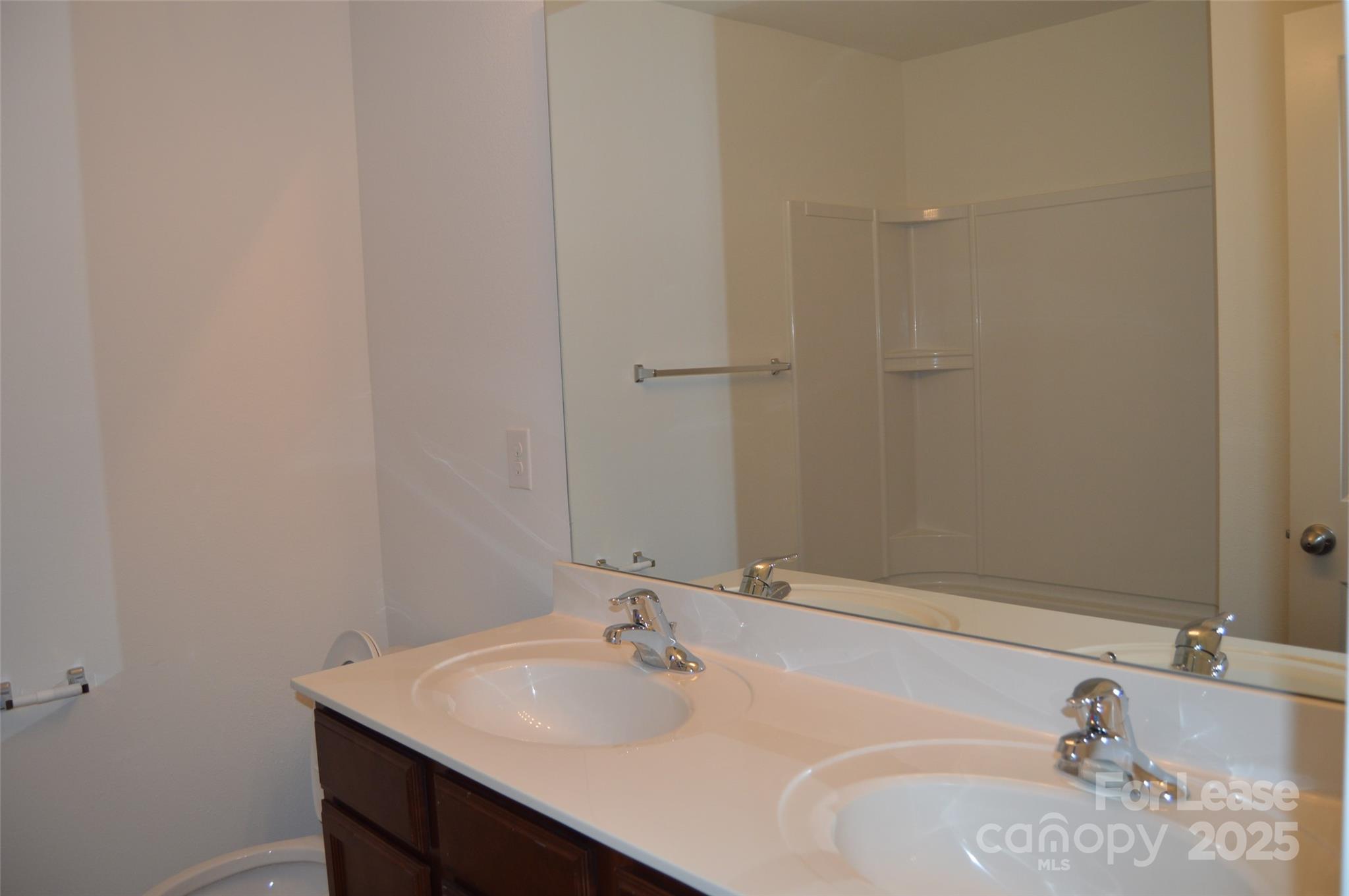 117 Quail Springs Road Statesville, NC 28677 - Photo 10 of 22 a bathroom with a sink and a mirror