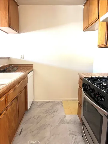 a kitchen with a stove and a microwave