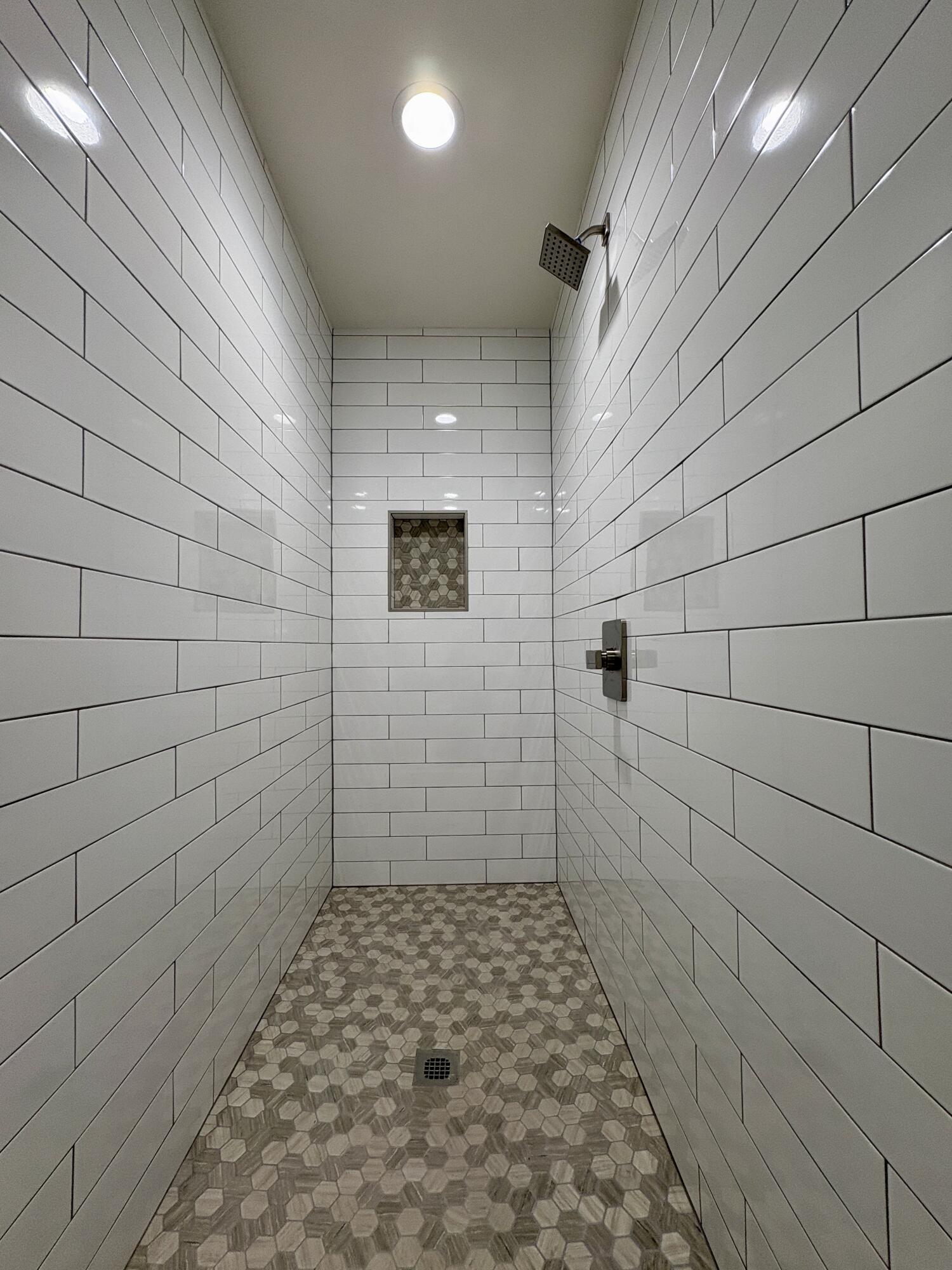 37132 Kendrick Circle, Unit B Palmdale, CA 93550 - Photo 6 of 10 a bathroom with a shower