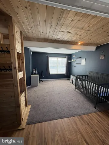 a view of a hallway with a couch