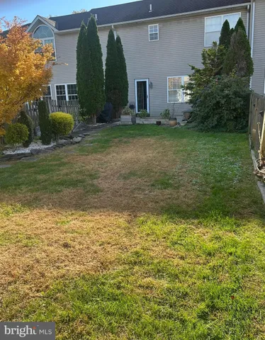 a view of outdoor space and yard