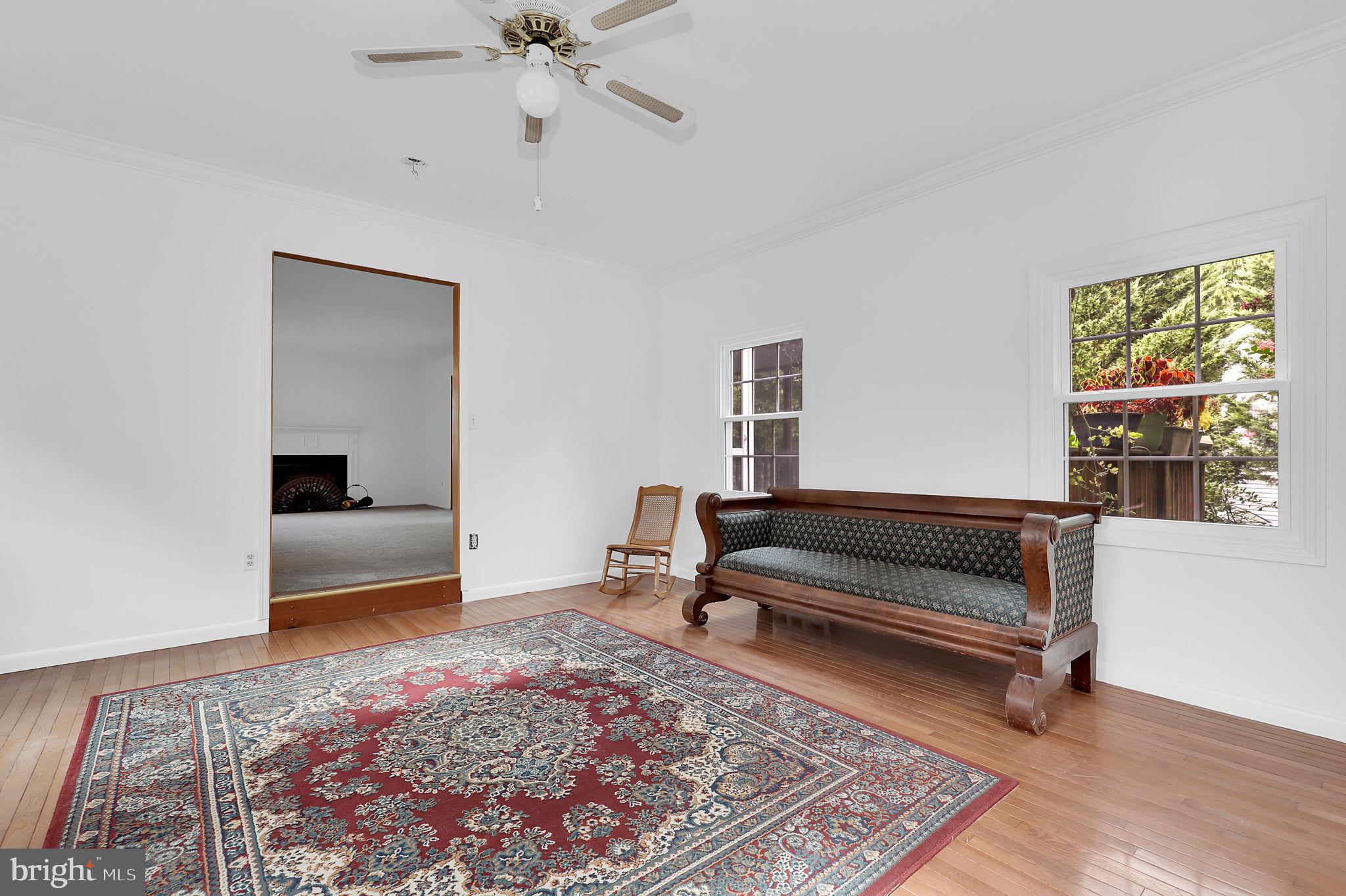 7922 Red Barn Way Elkridge, MD 21075 - Photo 11 of 31 a bedroom with furniture and a window