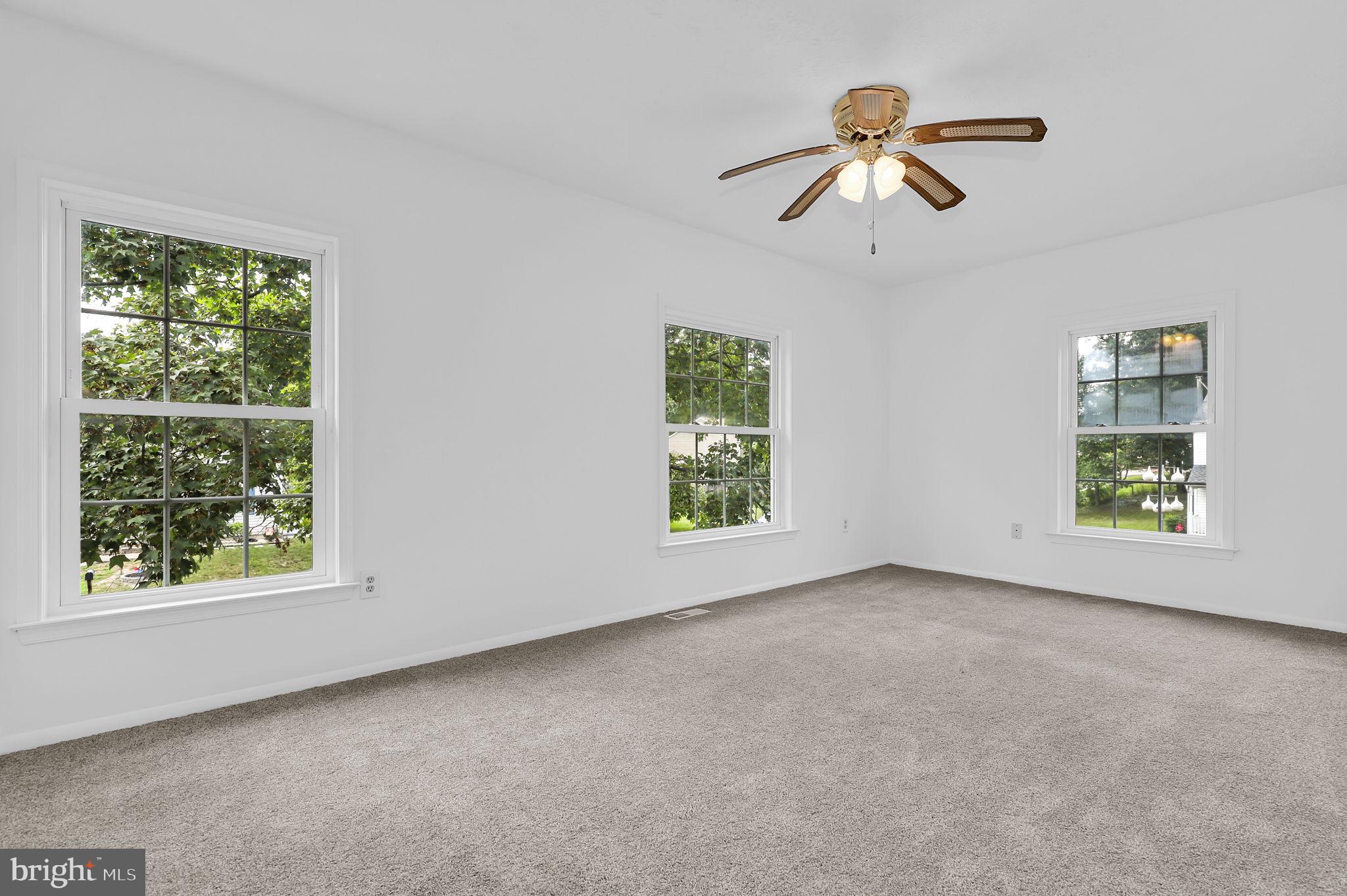 7922 Red Barn Way Elkridge, MD 21075 - Photo 14 of 31 a view of room with window and ceiling fan