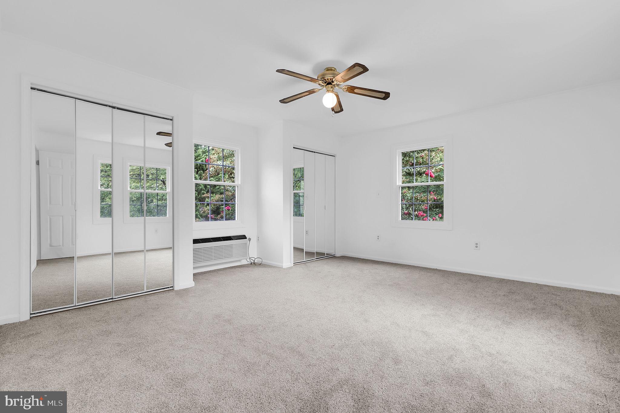 7922 Red Barn Way Elkridge, MD 21075 - Photo 15 of 31 a view of empty room with windows