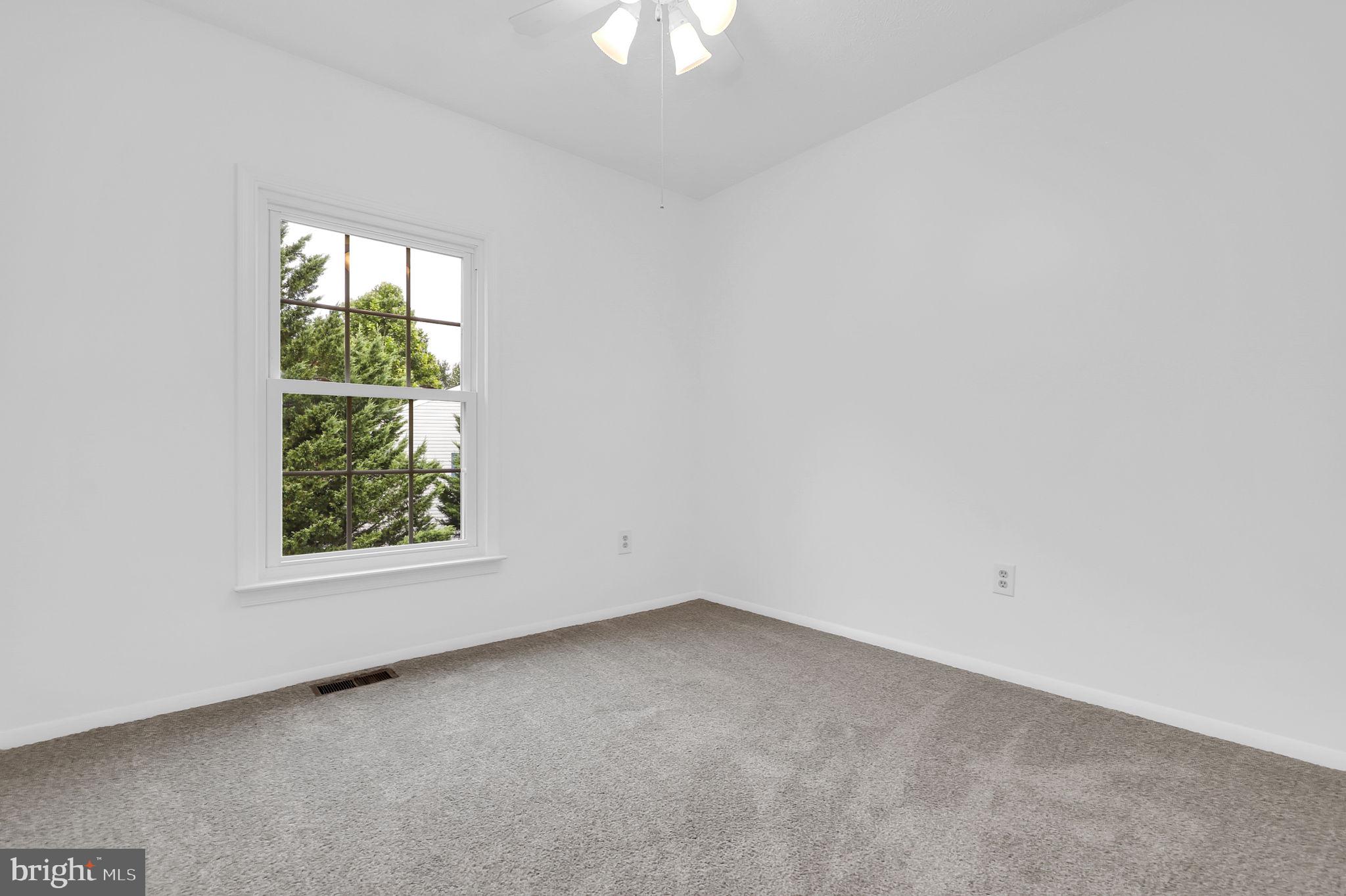 7922 Red Barn Way Elkridge, MD 21075 - Photo 18 of 31 an empty room with a window