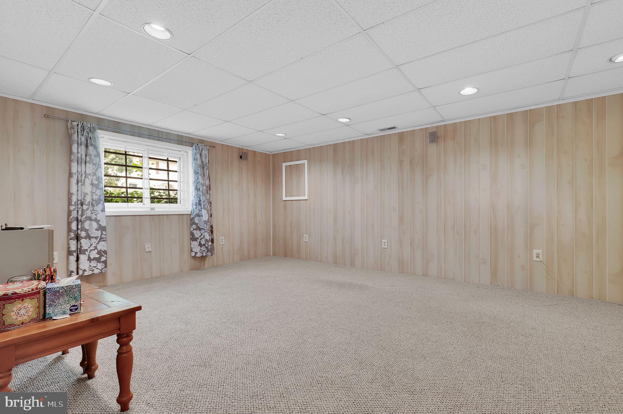 7922 Red Barn Way Elkridge, MD 21075 - Photo 22 of 31 a view of an empty room with a window