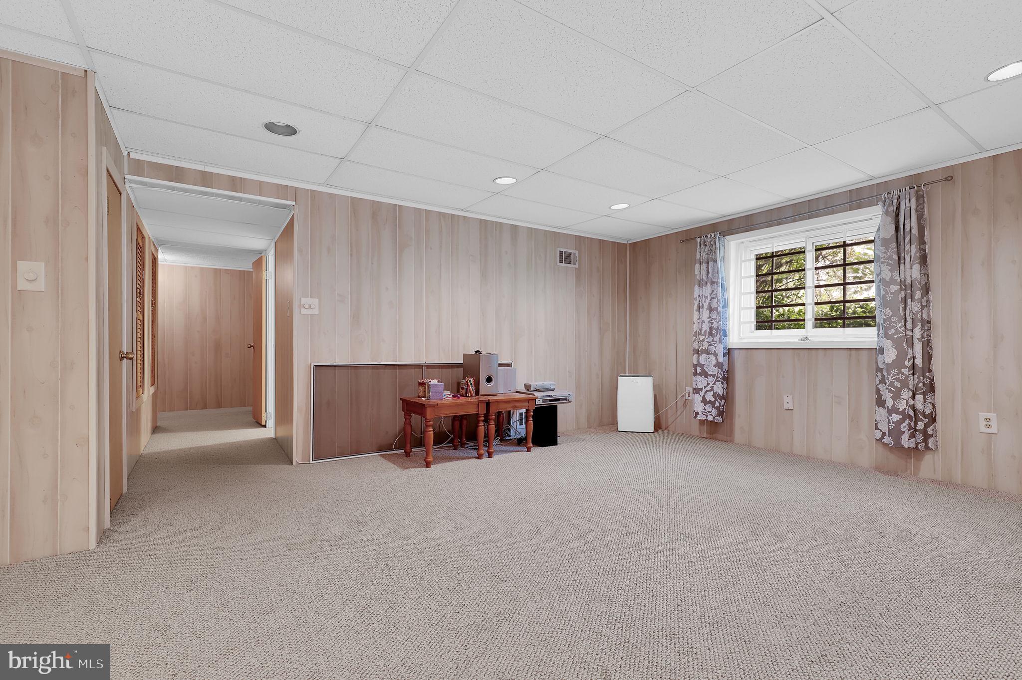 7922 Red Barn Way Elkridge, MD 21075 - Photo 23 of 31 a view of a livingroom with furniture and window