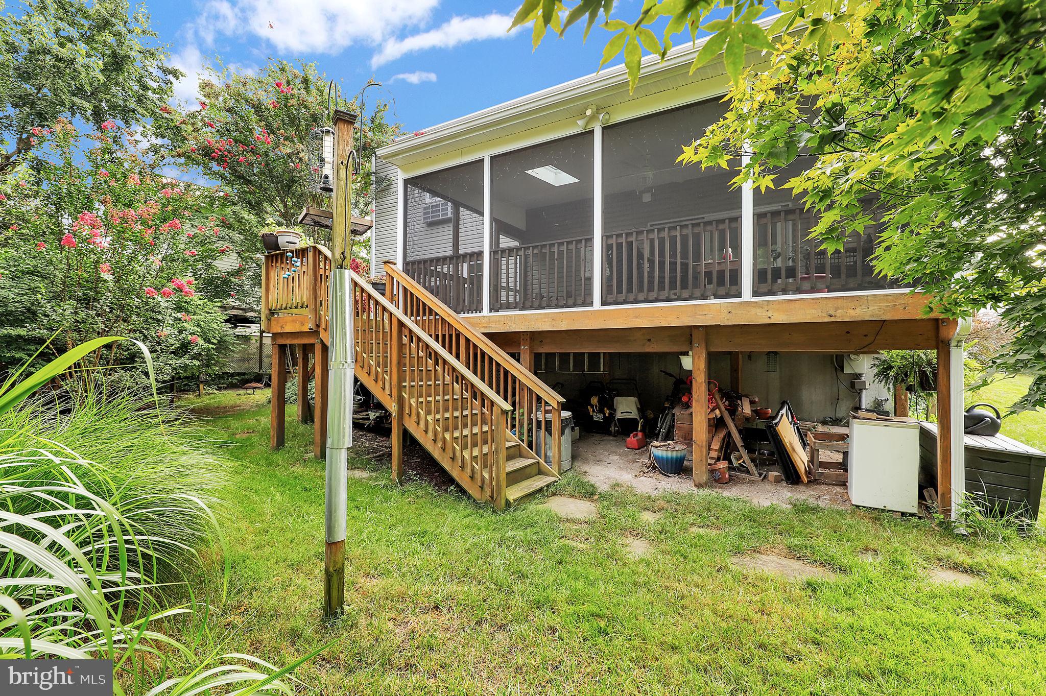 7922 Red Barn Way Elkridge, MD 21075 - Photo 27 of 31 a view of a house with a backyard