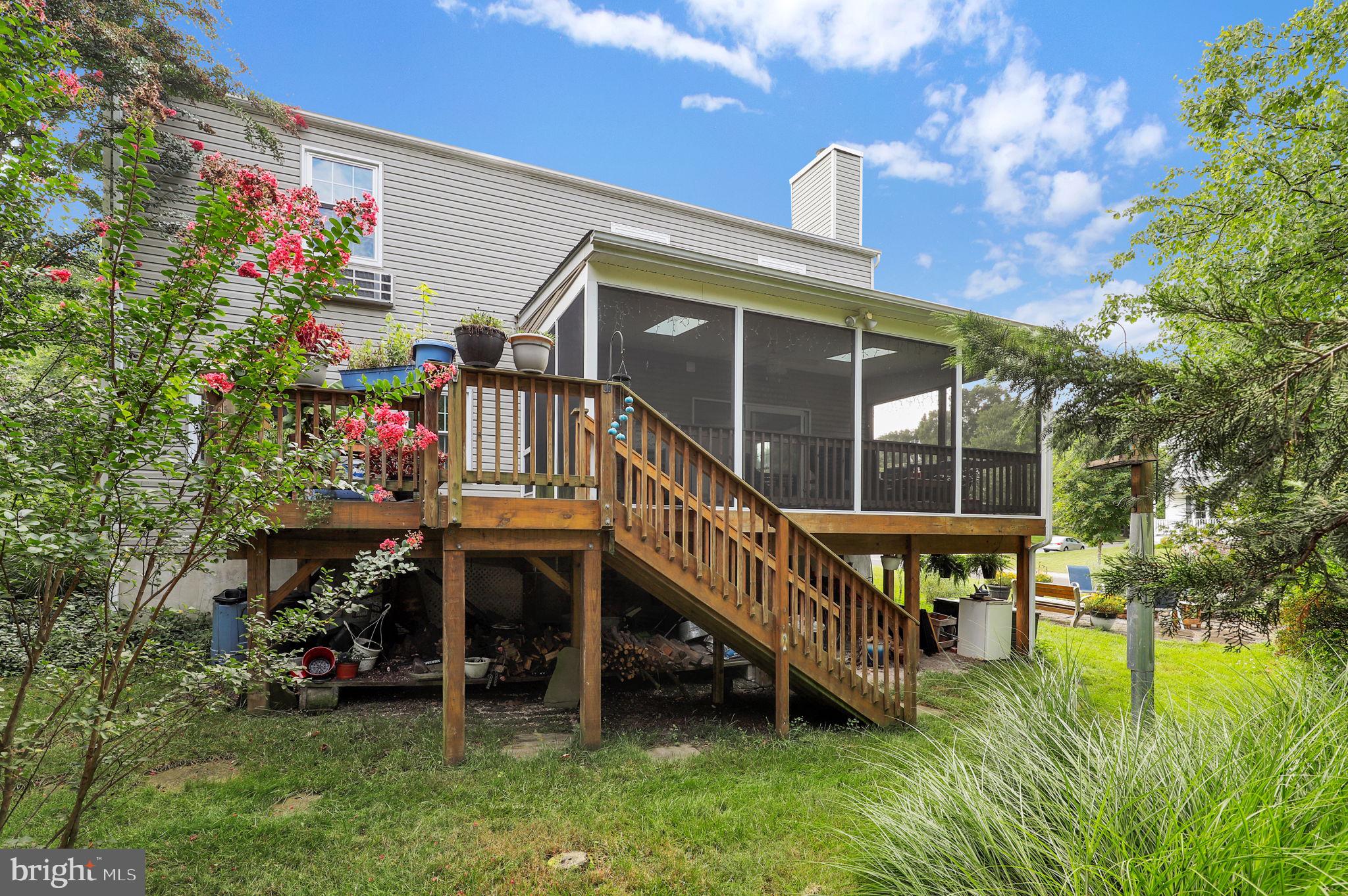 7922 Red Barn Way Elkridge, MD 21075 - Photo 28 of 31 a view of a house with a yard balcony and sitting area