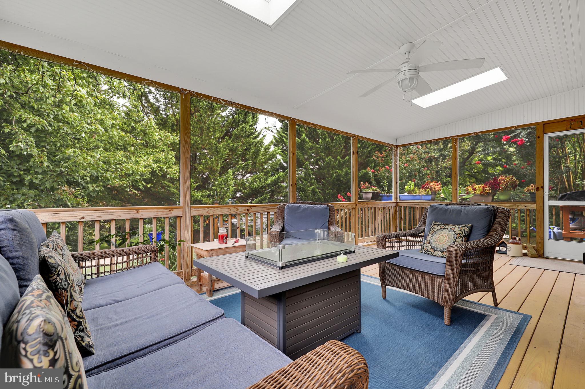 7922 Red Barn Way Elkridge, MD 21075 - Photo 9 of 31 a living room with furniture and a floor to ceiling window