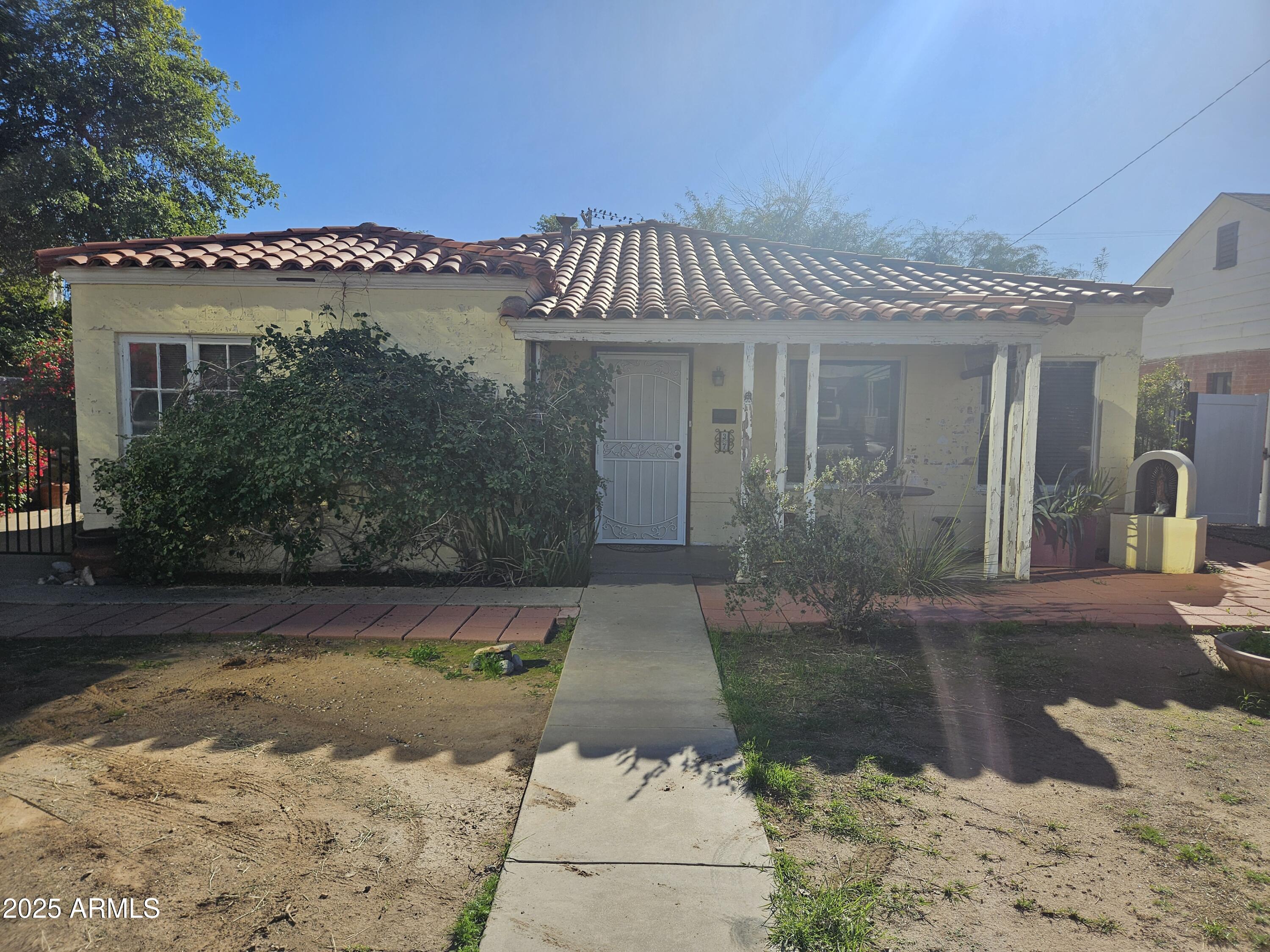 37 Virginia Avenue Phoenix, AZ 85004 - Photo 2 of 5 a view of a house with a yard