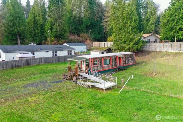 a backyard of a house with lots of green space