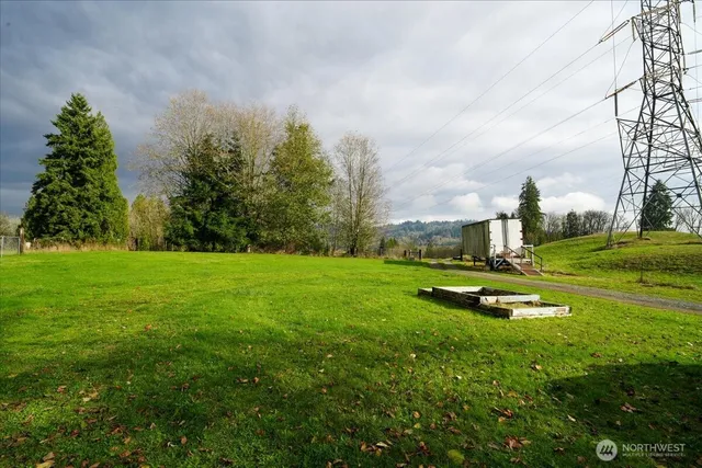 a view of lake with green space