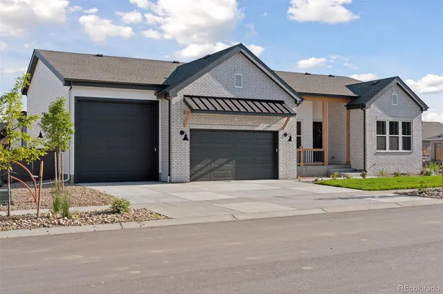 front view of a house with a street