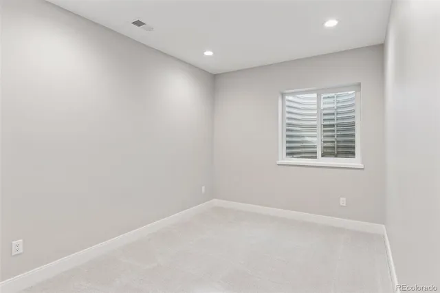 a front view of house with yard and outdoor seating