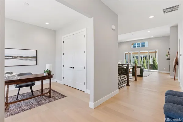 a view of a livingroom with furniture and furniture