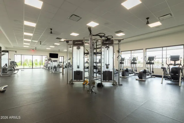 a view of swimming pool with a table and chairs