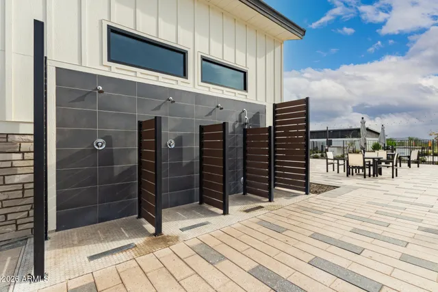 an aerial view of a house with swimming pool