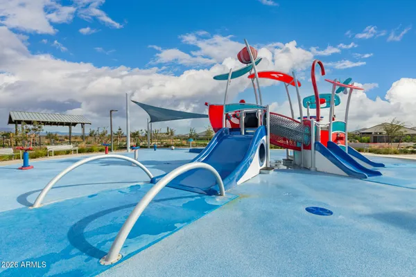 an aerial view of a city with ocean view