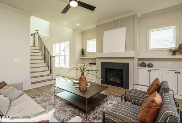 755 West Holly Springs Road Holly Springs, NC 27540 - Photo 14 of 45 a living room with furniture and a fireplace