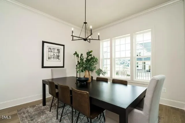 a bathroom with a granite countertop sink a mirror and a bathtub