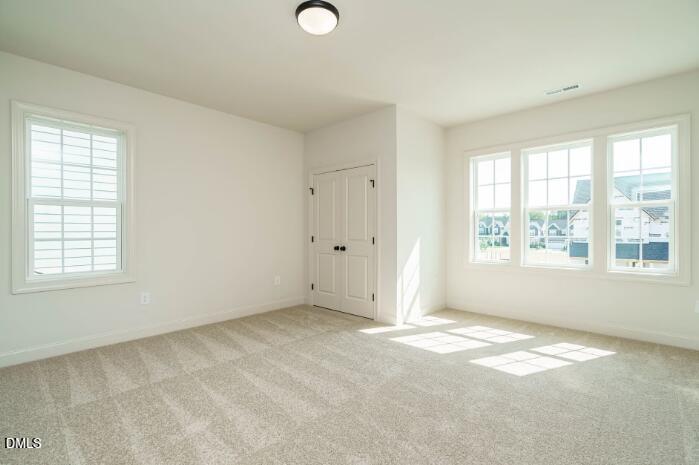 755 West Holly Springs Road Holly Springs, NC 27540 - Photo 34 of 45 a view of an empty room with a window
