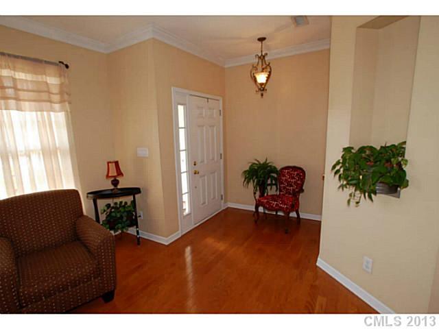 2005 Brook Valley Run Monroe, NC 28110 - Photo 2 of 15 a living room with furniture and a potted plant