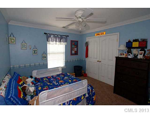 2005 Brook Valley Run Monroe, NC 28110 - Photo 11 of 15 a living room with furniture and a window