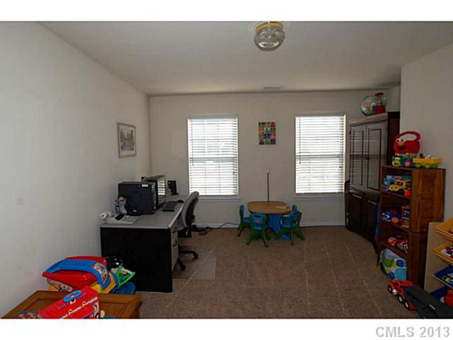 2005 Brook Valley Run Monroe, NC 28110 - Photo 13 of 15 a living room with furniture and a window