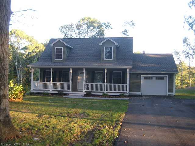 16 Cedar Ridge Road Ledyard, CT 06335 - Photo 1 of 1 a front view of a house with a yard