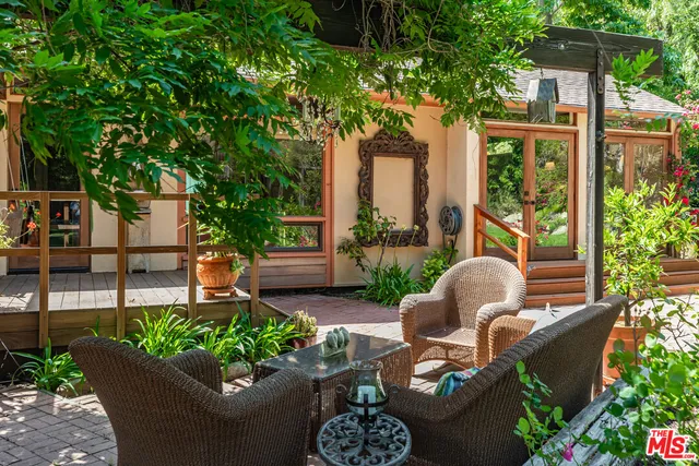 a view of a park with large trees