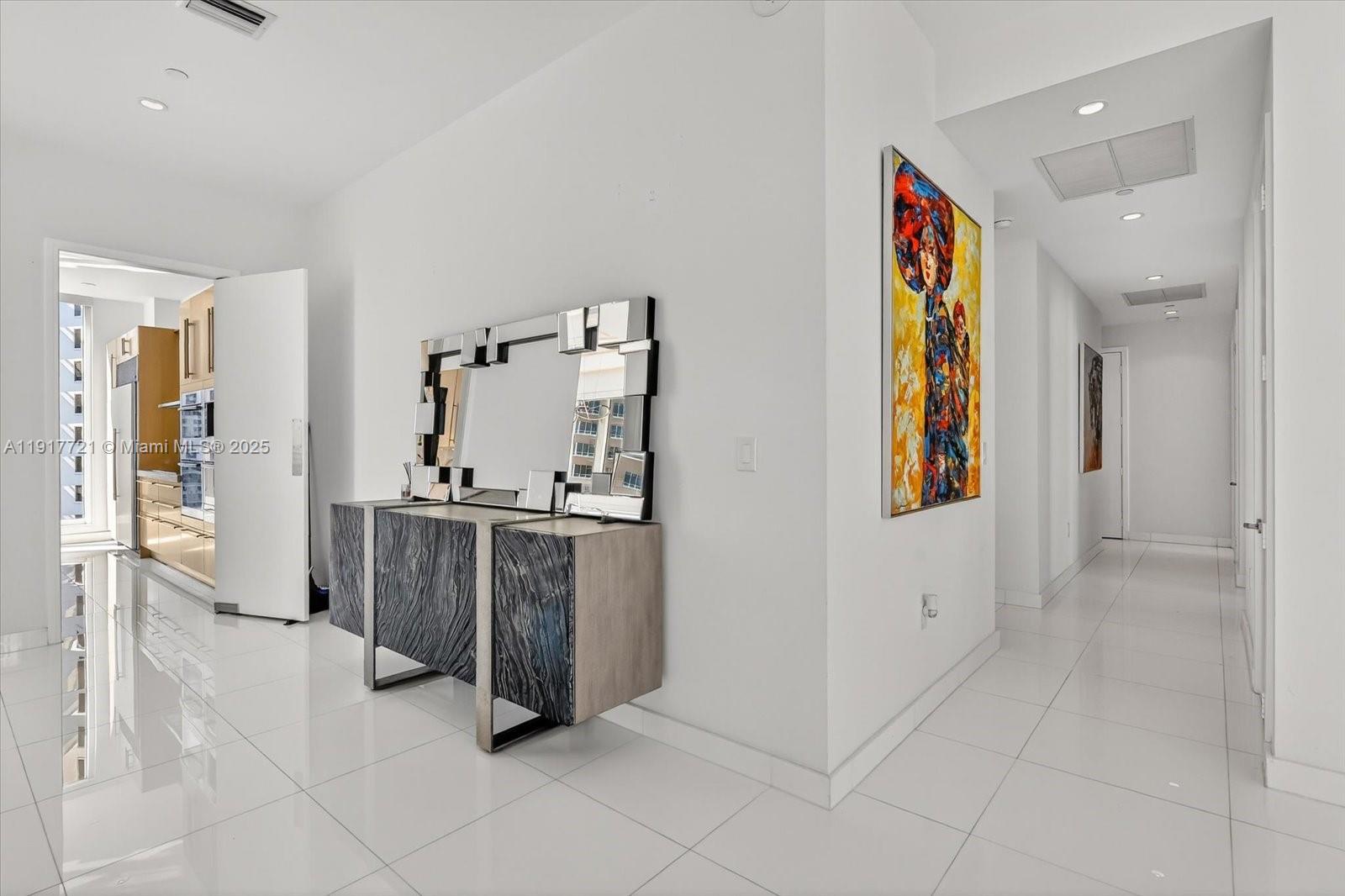 900 Brickell Key Boulevard, Unit 2304 Miami, FL 33131 - Photo 18 of 55 a view of kitchen with furniture and window