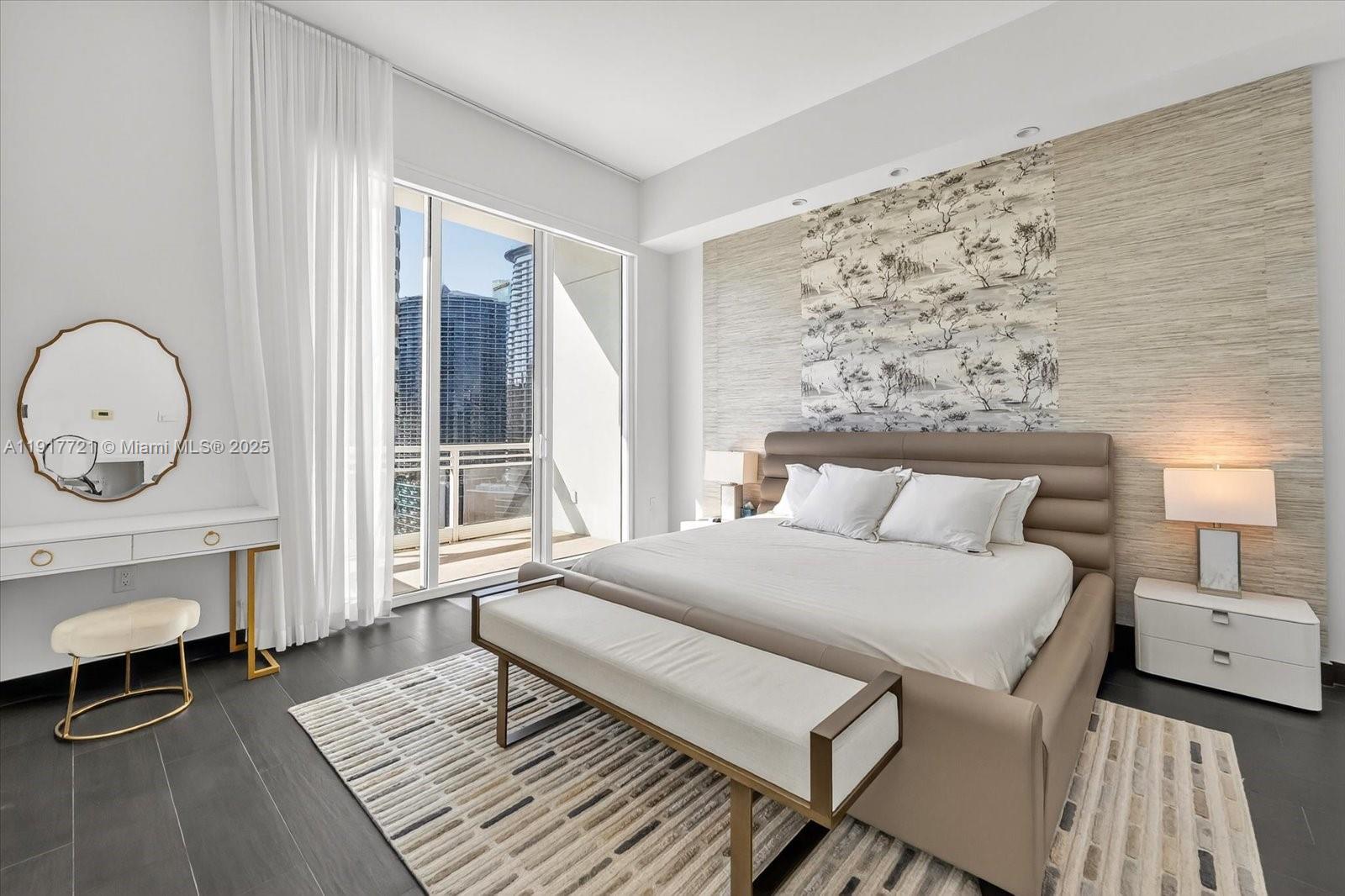 900 Brickell Key Boulevard, Unit 2304 Miami, FL 33131 - Photo 30 of 55 a bedroom with a bed chair and a window