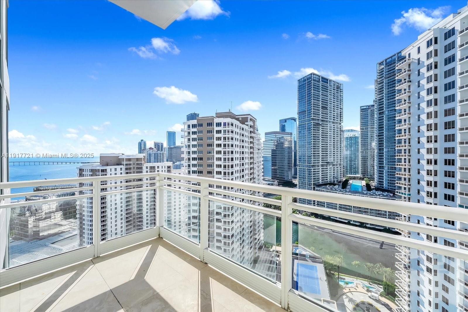900 Brickell Key Boulevard, Unit 2304 Miami, FL 33131 - Photo 32 of 55 a view of a city with tall buildings