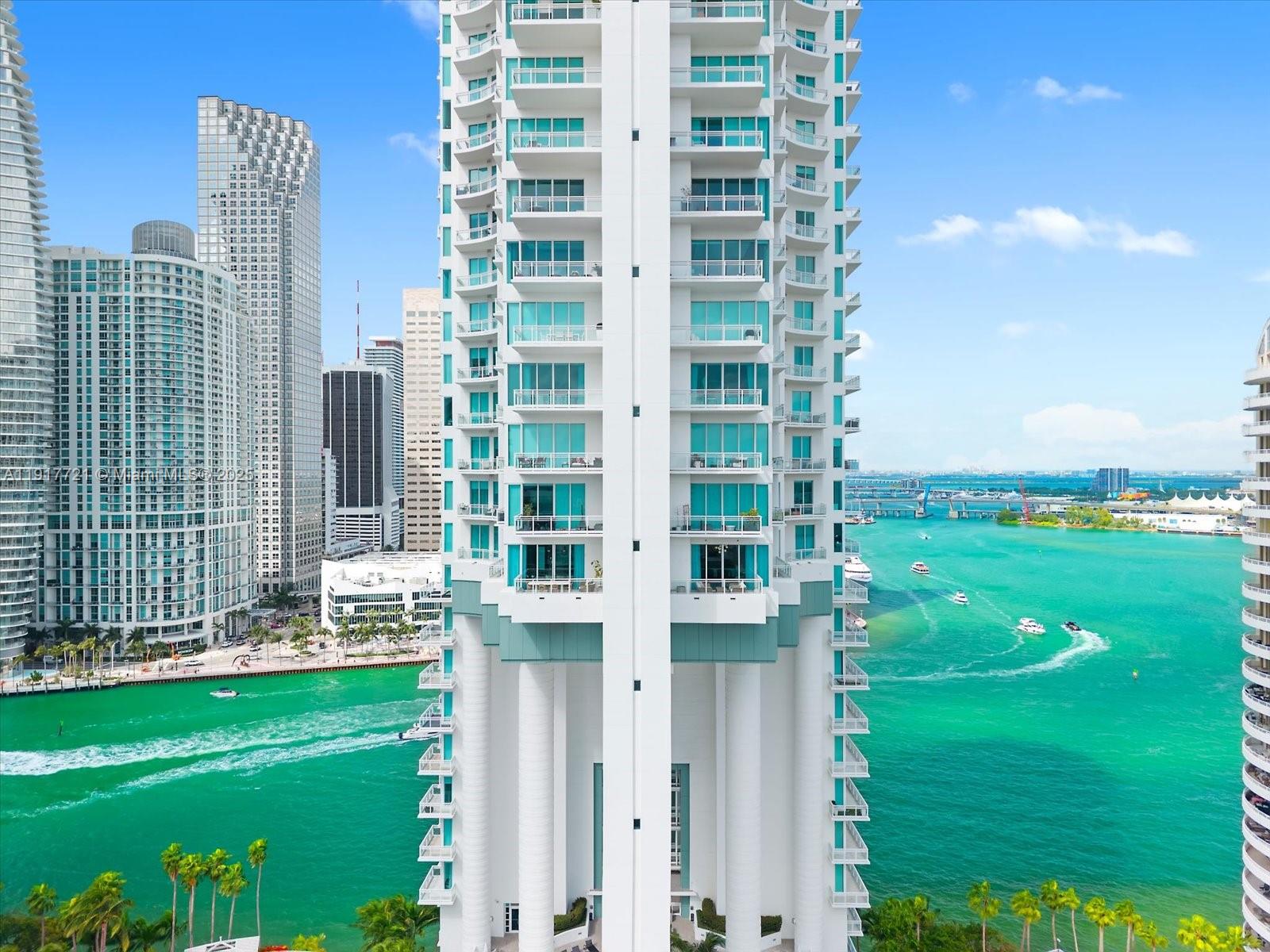 900 Brickell Key Boulevard, Unit 2304 Miami, FL 33131 - Photo 50 of 55 a view of a city with tall buildings