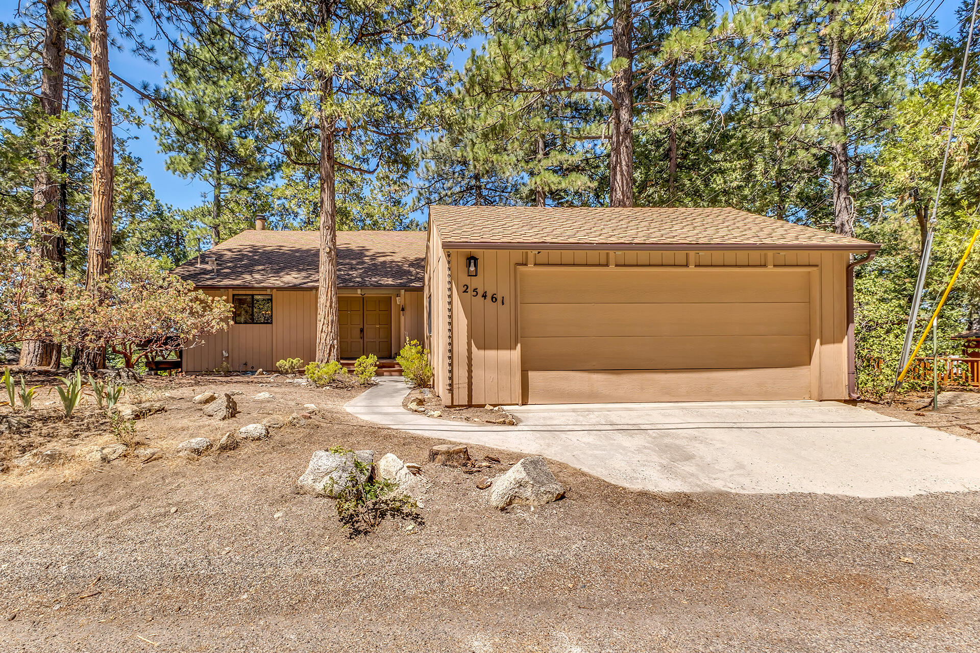 25461 Shadow Oaks Idyllwild, CA 92549 - Photo 6 of 30 a front view of a house with a yard