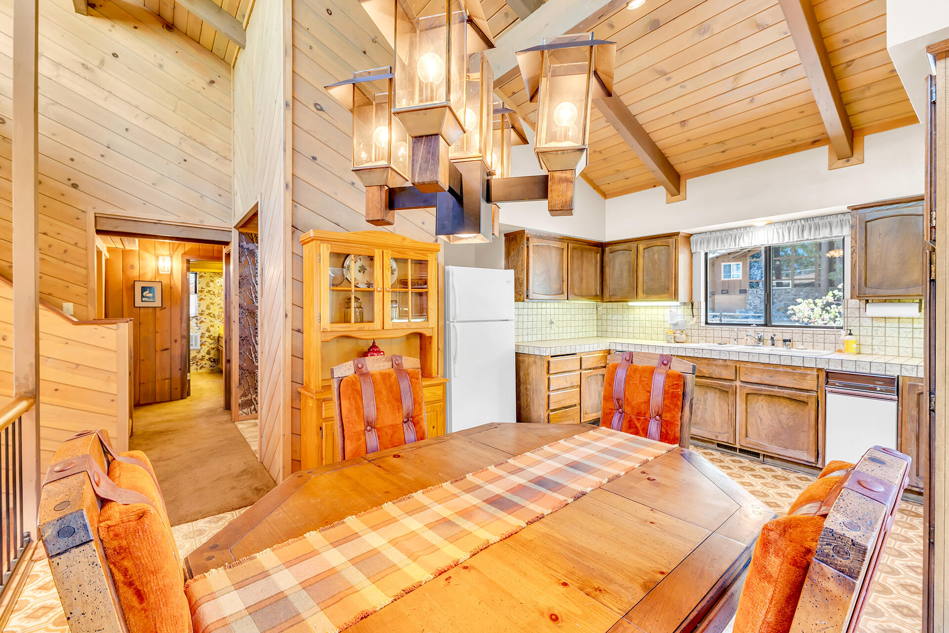 25461 Shadow Oaks Idyllwild, CA 92549 - Photo 8 of 30 a bedroom with a bed and wooden cabinets