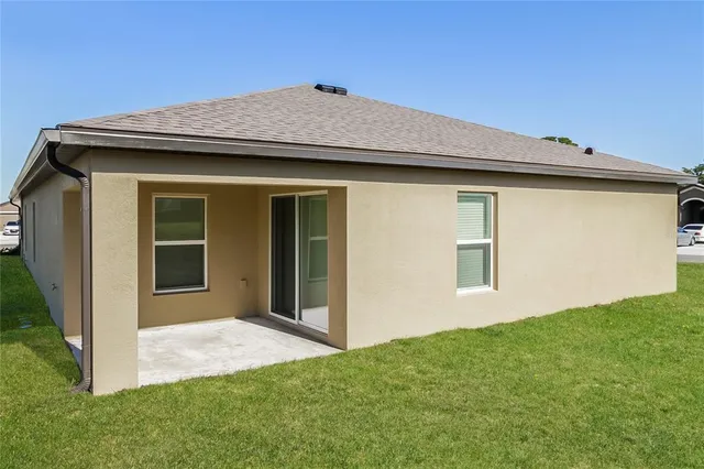 a picture of a bench in front of a wall