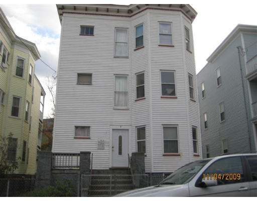 a view of a house with a street
