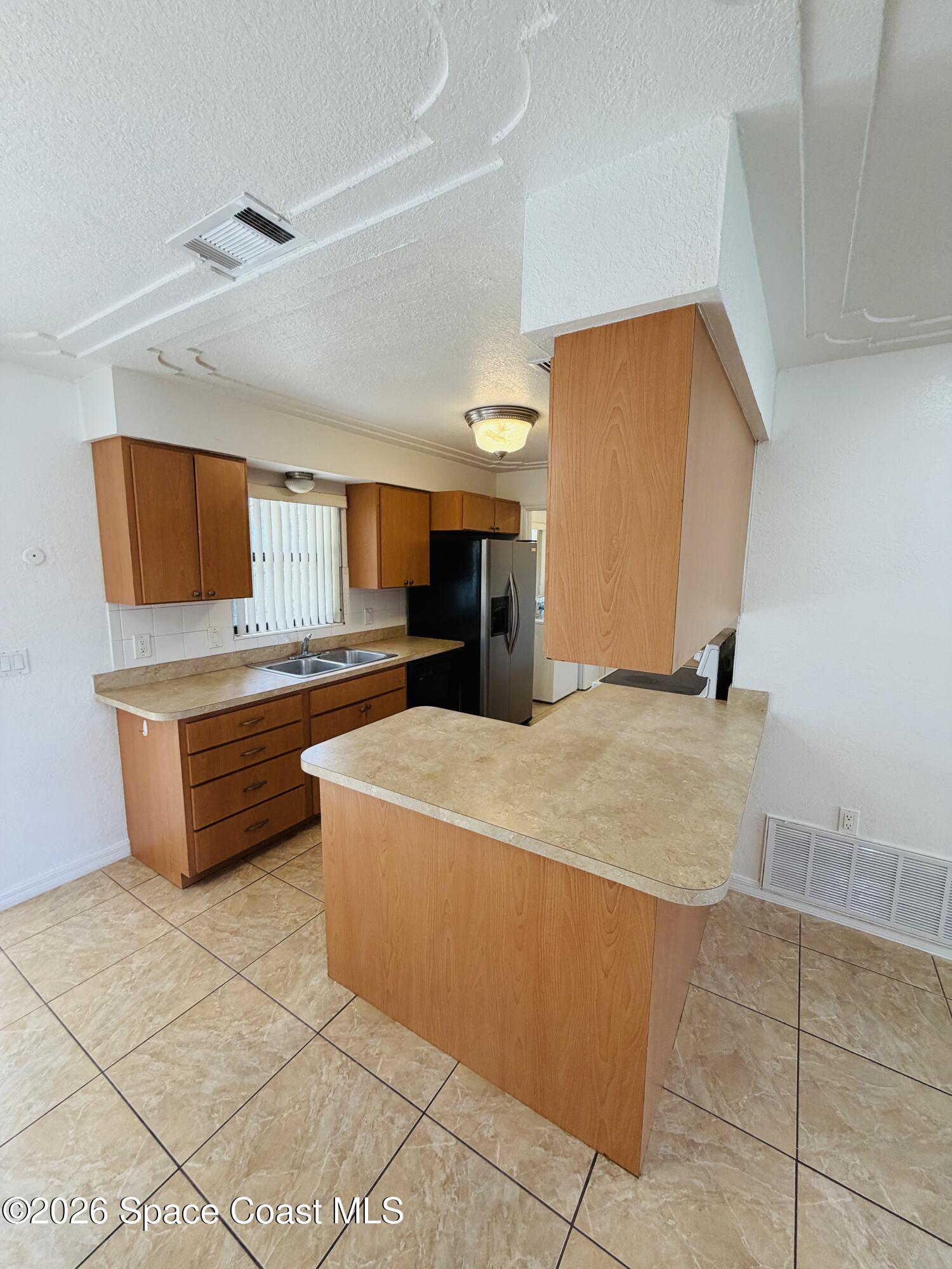 981 Palmer Street Rockledge, FL 32955 - Photo 3 of 16 IMG_7328