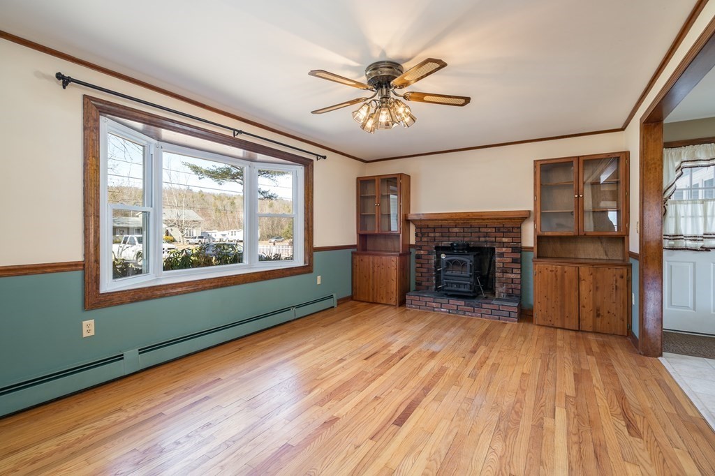 30 County Road Holyoke, MA 01040 - Photo 19 of 38 wooden floor in an empty room with a window