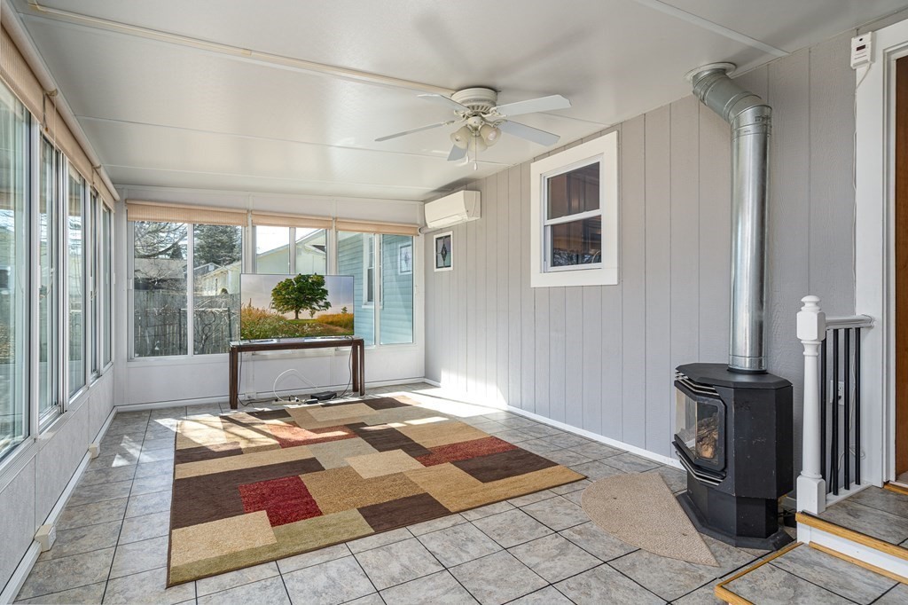 30 County Road Holyoke, MA 01040 - Photo 25 of 38 a living room with patio furniture and a rug